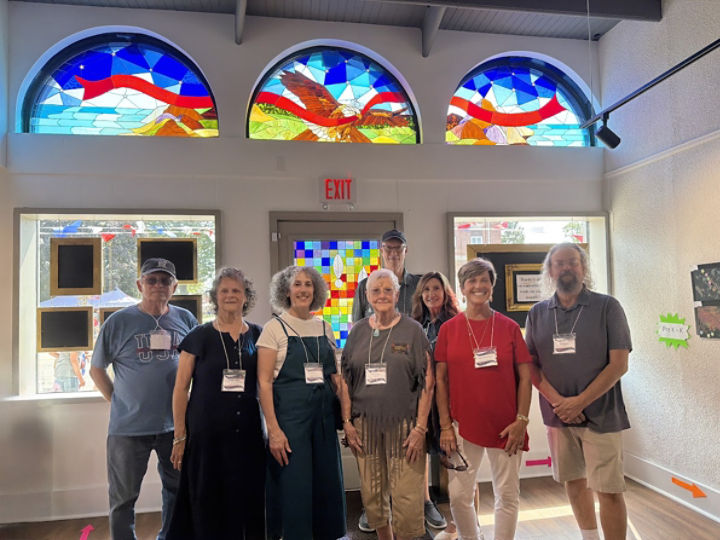 Artists with their finished work at the unveiling